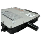 Voltacon VMI600 microinverter top view showing white metal cover plate with specifications label, silver mounting screws, bar