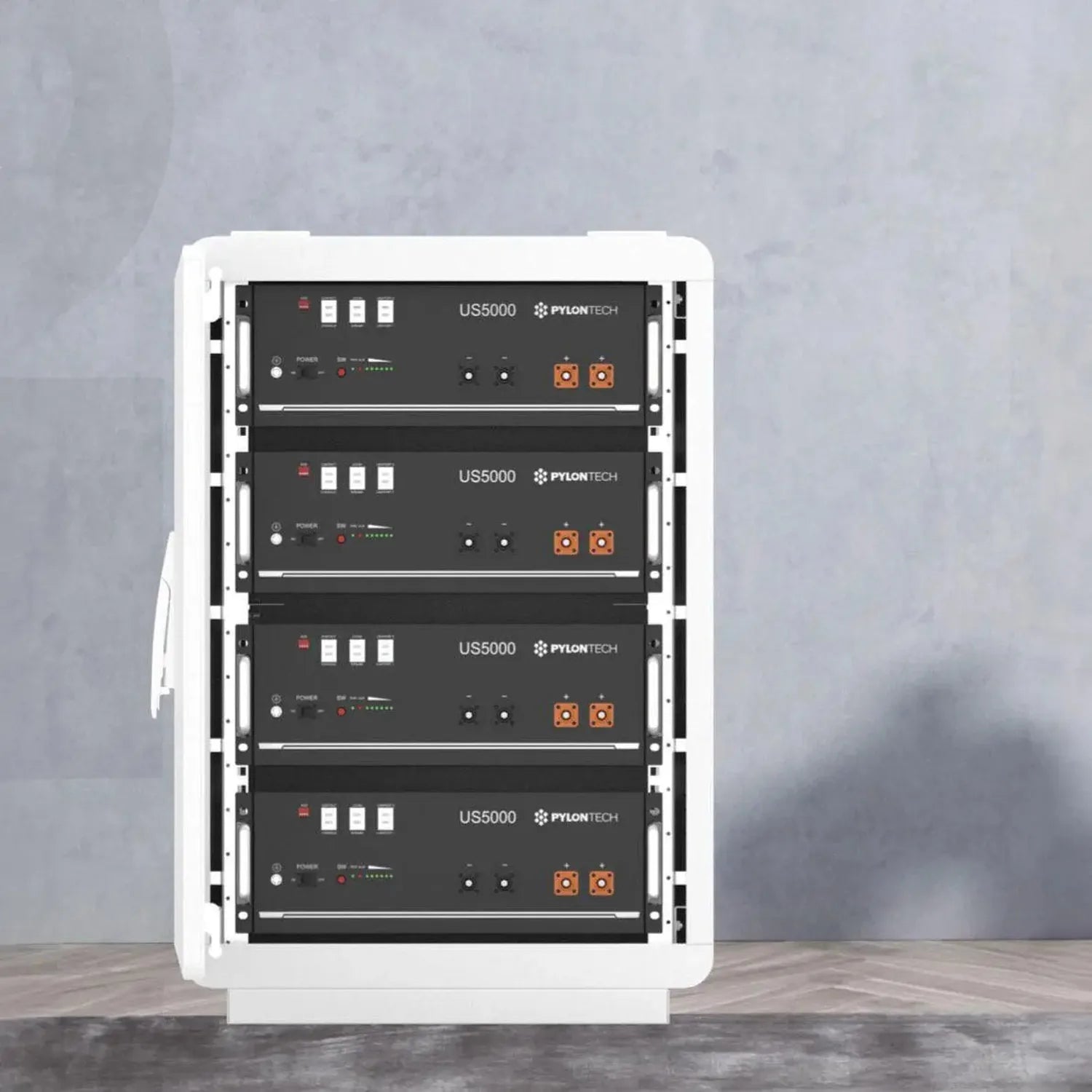 White battery cabinet housing four stacked black Pylontech US5000 units with control panels and orange connectors.