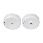 Two white round LED emergency spot lights shown front view, displaying center lens and small indicator lights on housing.