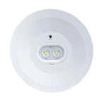 White circular ceiling-mounted emergency light with dual LED spotlights and small camera or sensor at top, viewed from below.