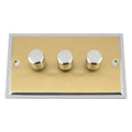 Three-gang brass dimmer switch with chrome knobs and silver frame, product shot on white background.