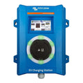 Victron Energy blue EV charging station with illuminated circular connector and digital display screen showing charging statu