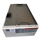 Open top view of Pylontech lithium battery module showing interior compartment with terminal connectors and safety labels on 