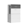 Pylontech Force FH3X hybrid solar inverter and battery stack with digital display showing 100% charge level.