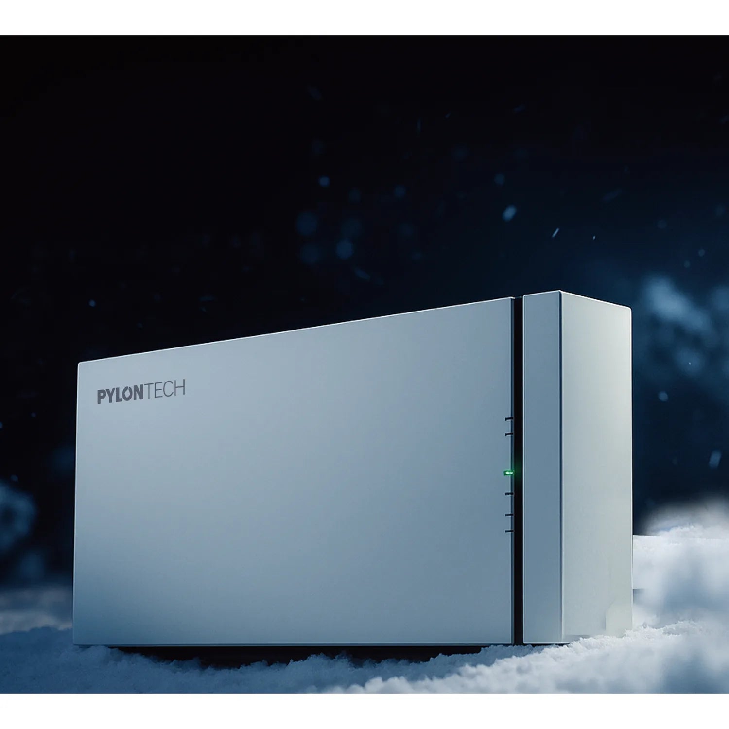 Pylontech Fidus Pro battery unit on snow with dark sky background, showing white rectangular enclosure with brand name and st