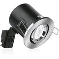 Brushed chrome recessed downlight with black cylindrical housing and tilting mechanism, shown at angle against white backgrou