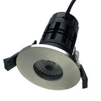 Fire rated LED downlight with brushed nickel trim ring and black mounting housing, shown against white background.