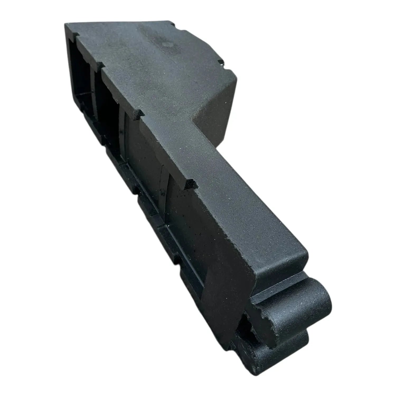 Black rubber ballast weight with integrated mini rail and angled top surface, product photography shot on white background.