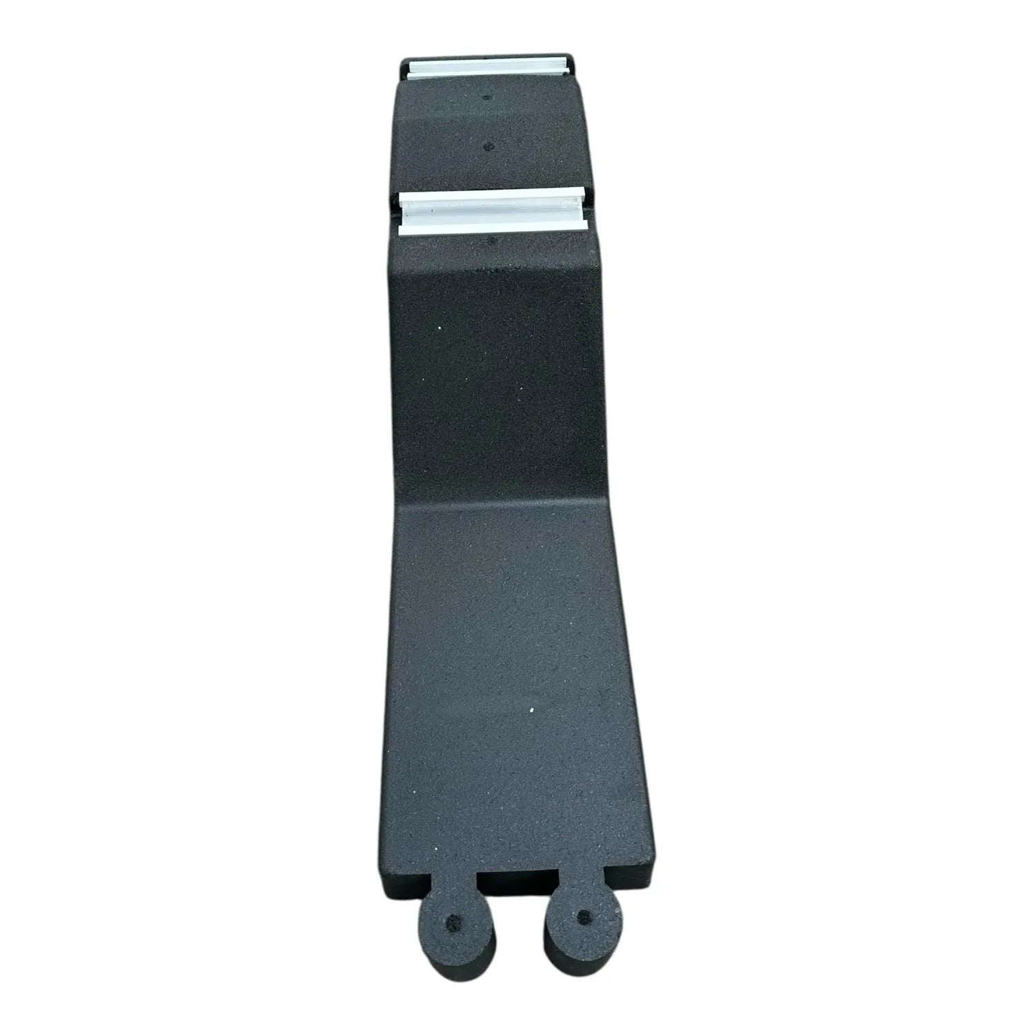Dark gray rubber ballast block with integrated mini rail and two circular feet, front view.
