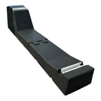 Black foam solar mounting rail with metal brackets, angled section, and adjustment knobs for flat roof installation.