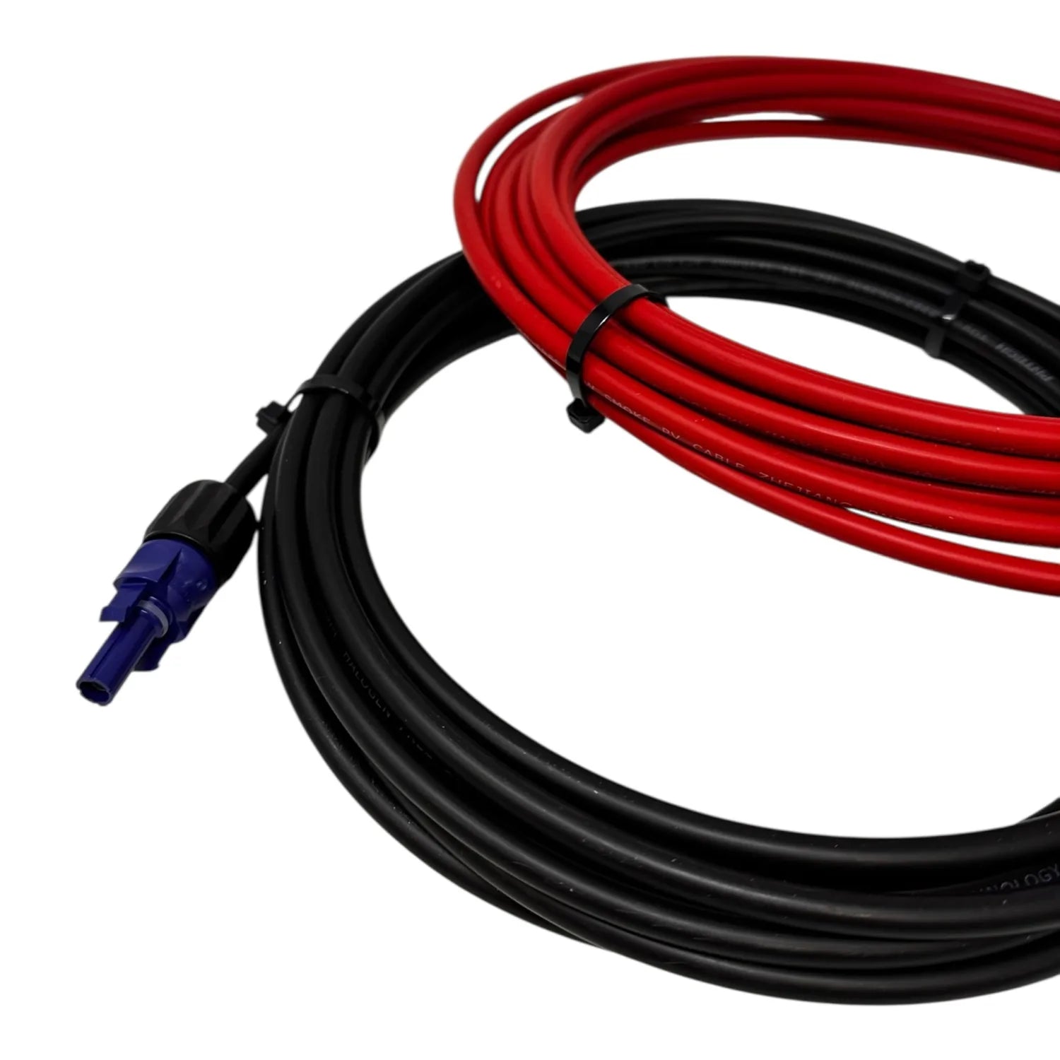 Red and black solar PV extension cable with blue connector, coiled against white background.