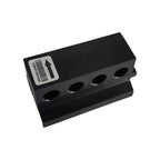 Black rectangular solar monitoring device with four circular ports and barcode label on top.