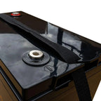 Close-up of black gel deep cycle battery with metal terminal post, black fabric strap, and red indicator light on top surface