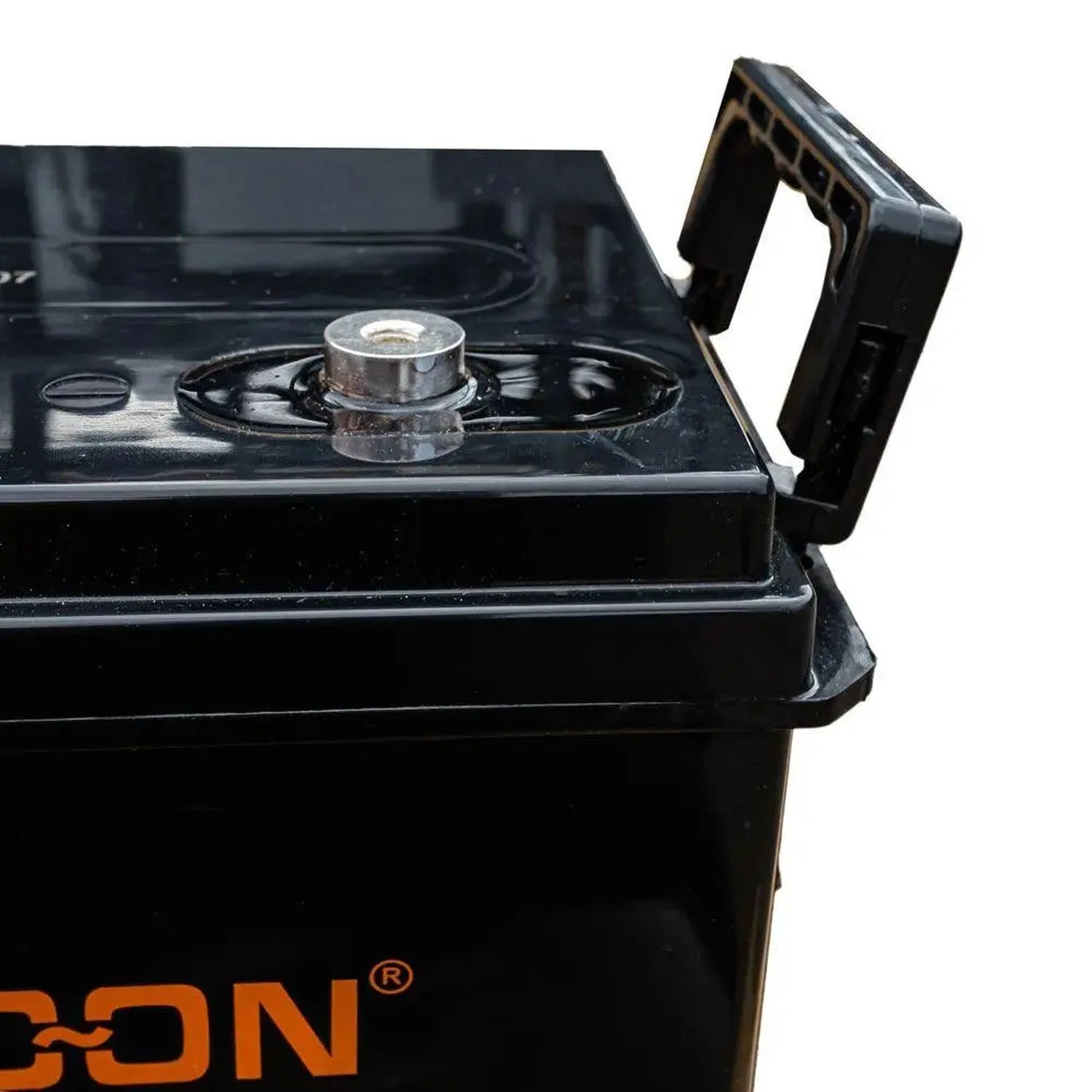 Black Voltacon gel solar battery with orange logo, showing top view with terminal cap and handle detail against white backgro