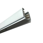 Close-up of white and black aluminum track rail showing internal wiring channels and electrical connectors.