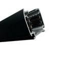 Cross-section view of black aluminum LED track rail with internal wiring and electrical contacts visible.
