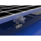 Close-up of solar panel mounting bracket installed on blue trapezoidal metal roof, showing metal clamp assembly and attachmen