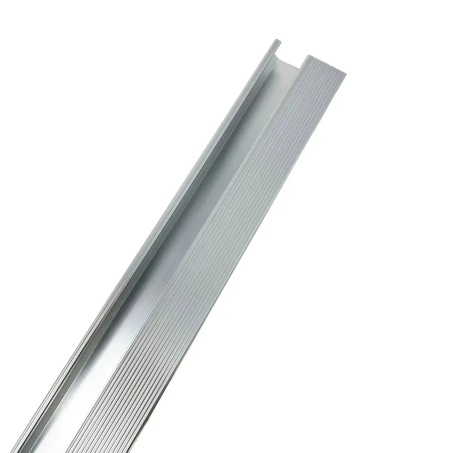 Silver aluminium mounting rail with grooved surface and channel slot, angled against white background