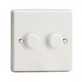 White 2-gang dimmer switch with two rotary controls and mounting screws visible on a plain background.
