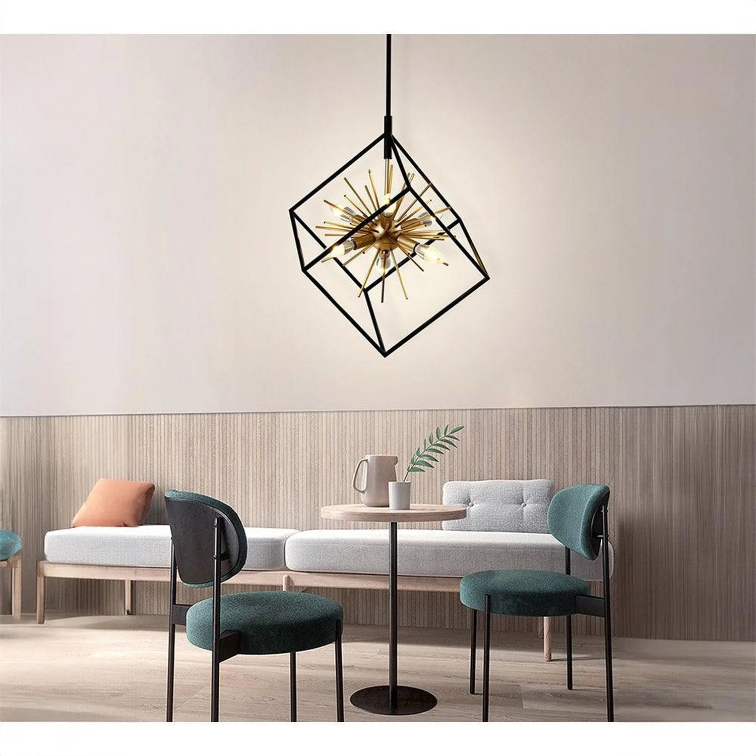 Astral LED pendant light with geometric black frame and brass starburst element, installed in modern lounge setting above din