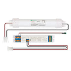 Emergency lighting kit showing NiCd battery pack, electronic control unit with terminal blocks, and wiring connections for LE