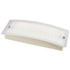 LED emergency bulkhead light with curved white translucent cover and cream-colored base, shown from angled view.