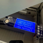 Blue LCD display showing analog info, BMS status, para setting, and sys setting menu options on lithium battery unit.