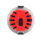 Top-down view of red LED downlight with gray trim ring and black adjustment straps, showing ventilation slots and central con