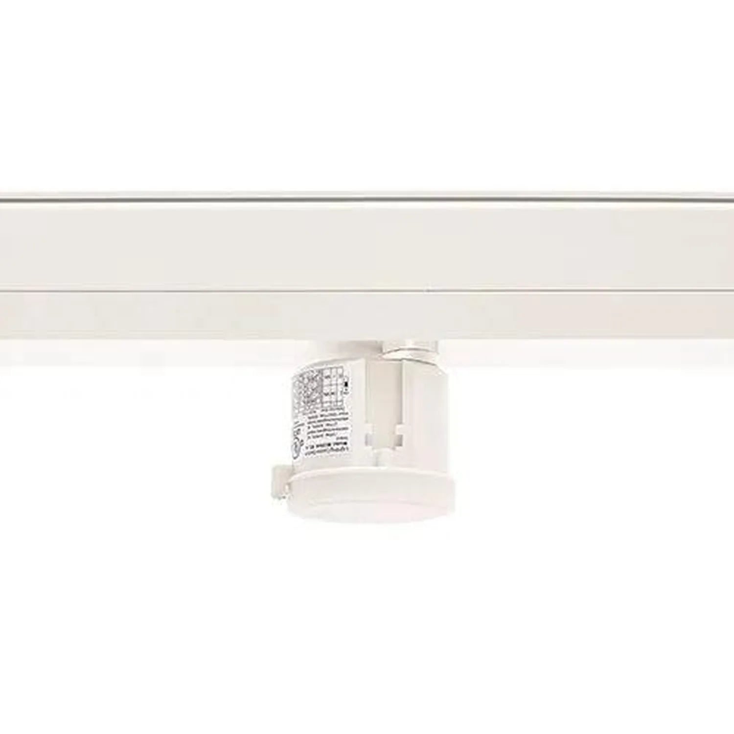 White daylight sensor module mounted to ceiling track with visible label and wiring specifications.