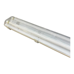 Linear LED tube fitting with polycarbonate housing and ribbed diffuser, mounted at angle on white background