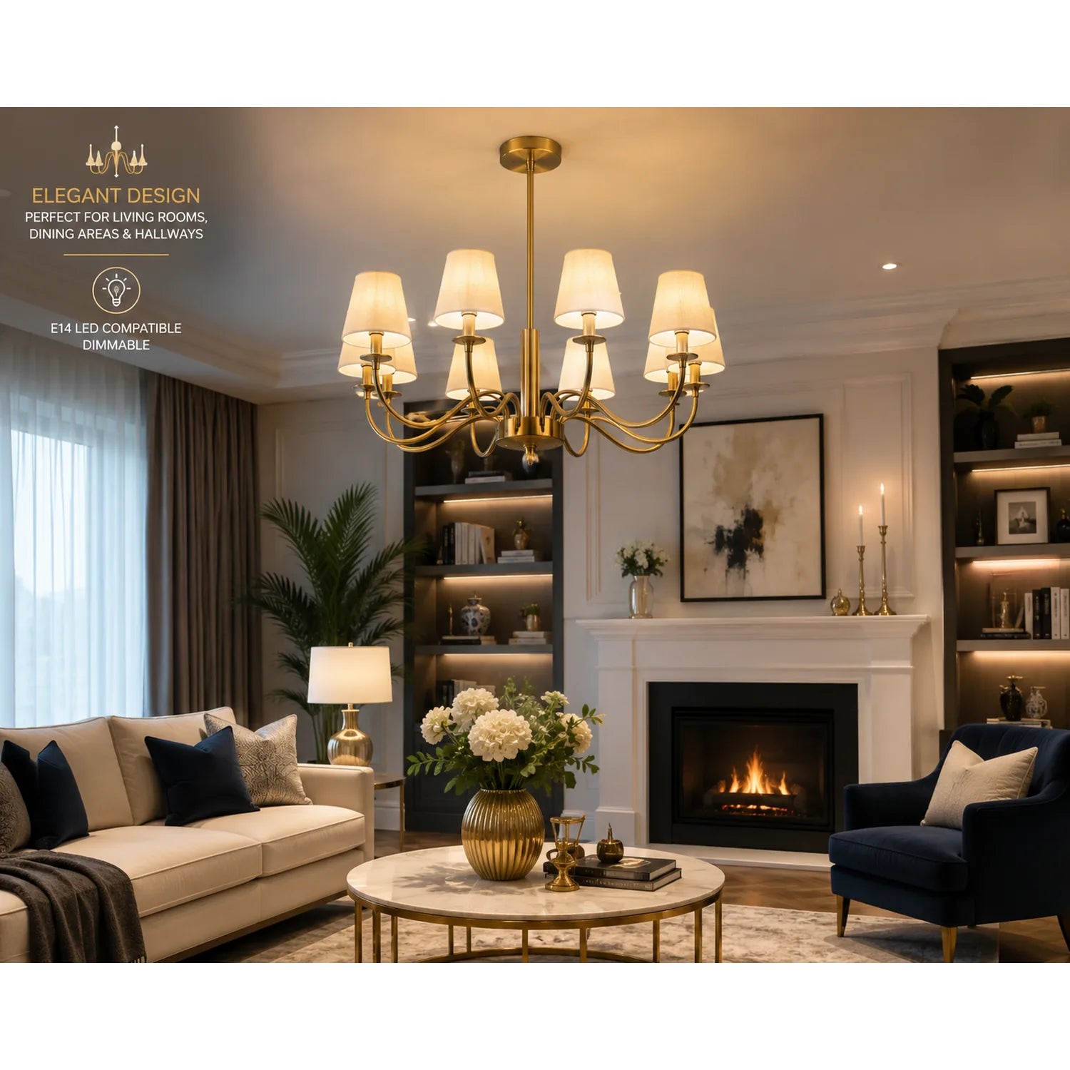 Gold chandelier with eight cream fabric shades installed in elegant living room above fireplace with dimmable LED lighting.