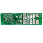 Green circuit board with integrated circuits on left side and multiple white terminal connectors arranged in rows on right si