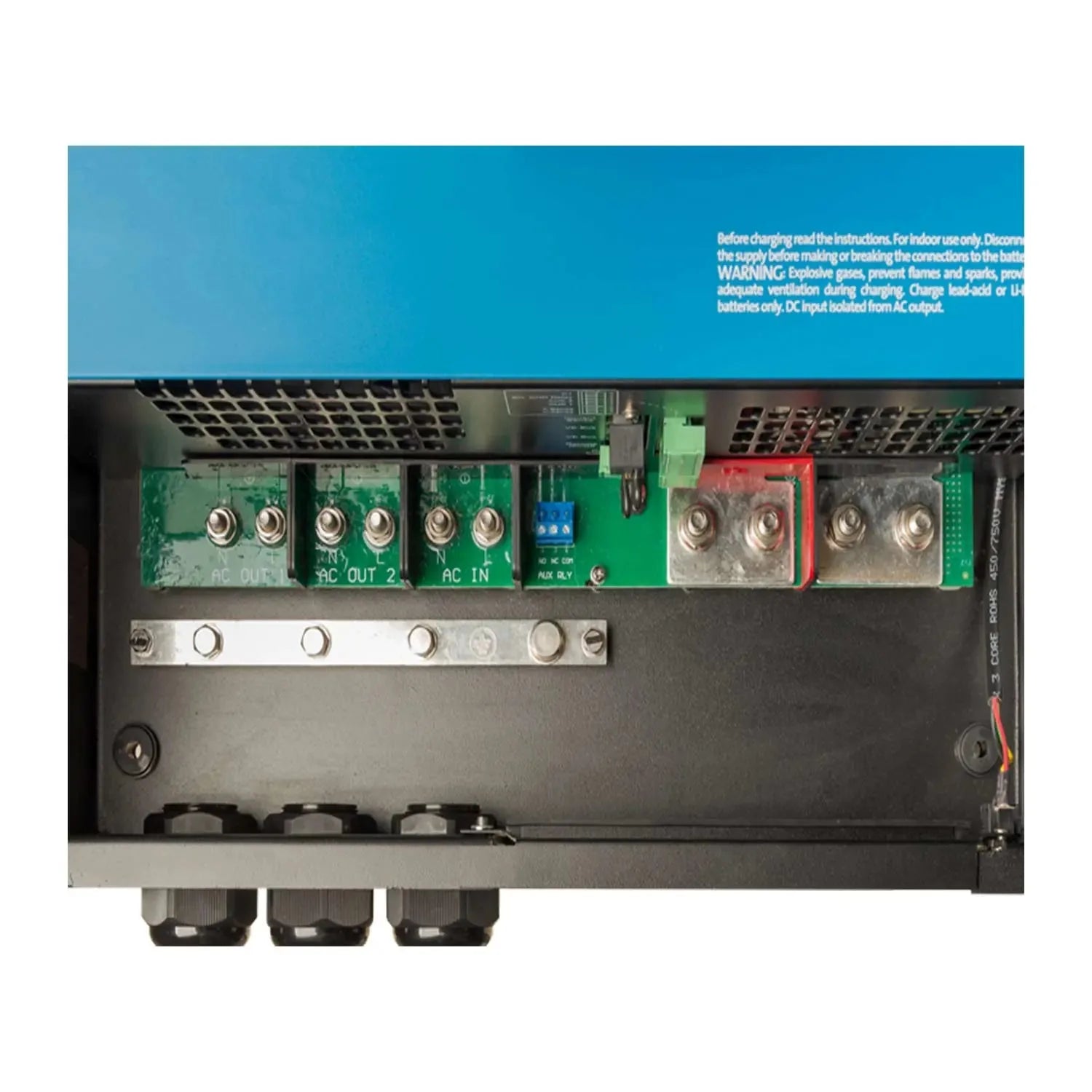 Interior view of Victron MultiPlus-II inverter charger showing circuit boards, terminal connectors, and AC/DC output connecti