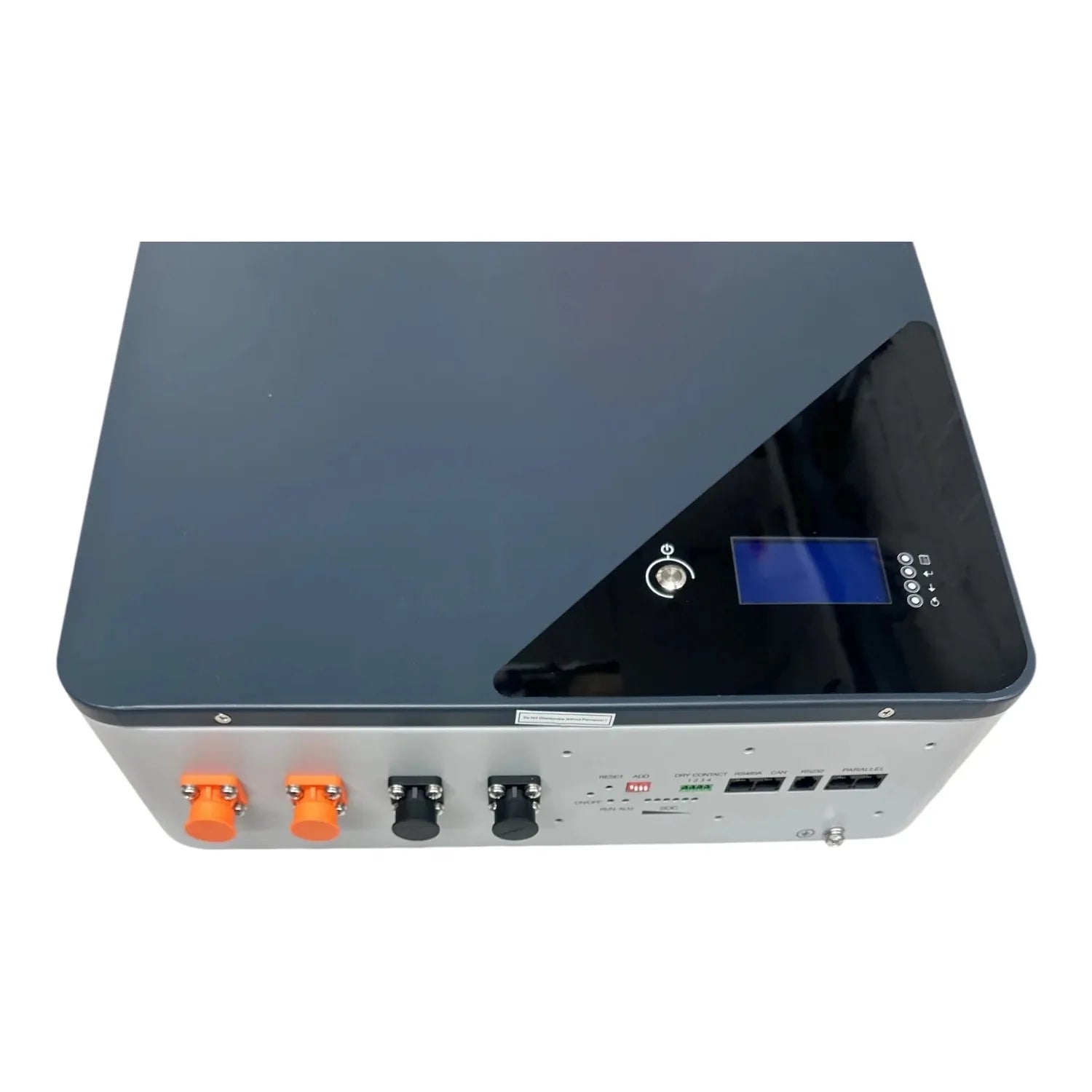 Top-down view of off-grid solar inverter with gray casing, blue LCD display, orange and black terminal connectors, and indica