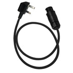 Black extension cable with UK 13A plug connector and industrial socket connector against white background.