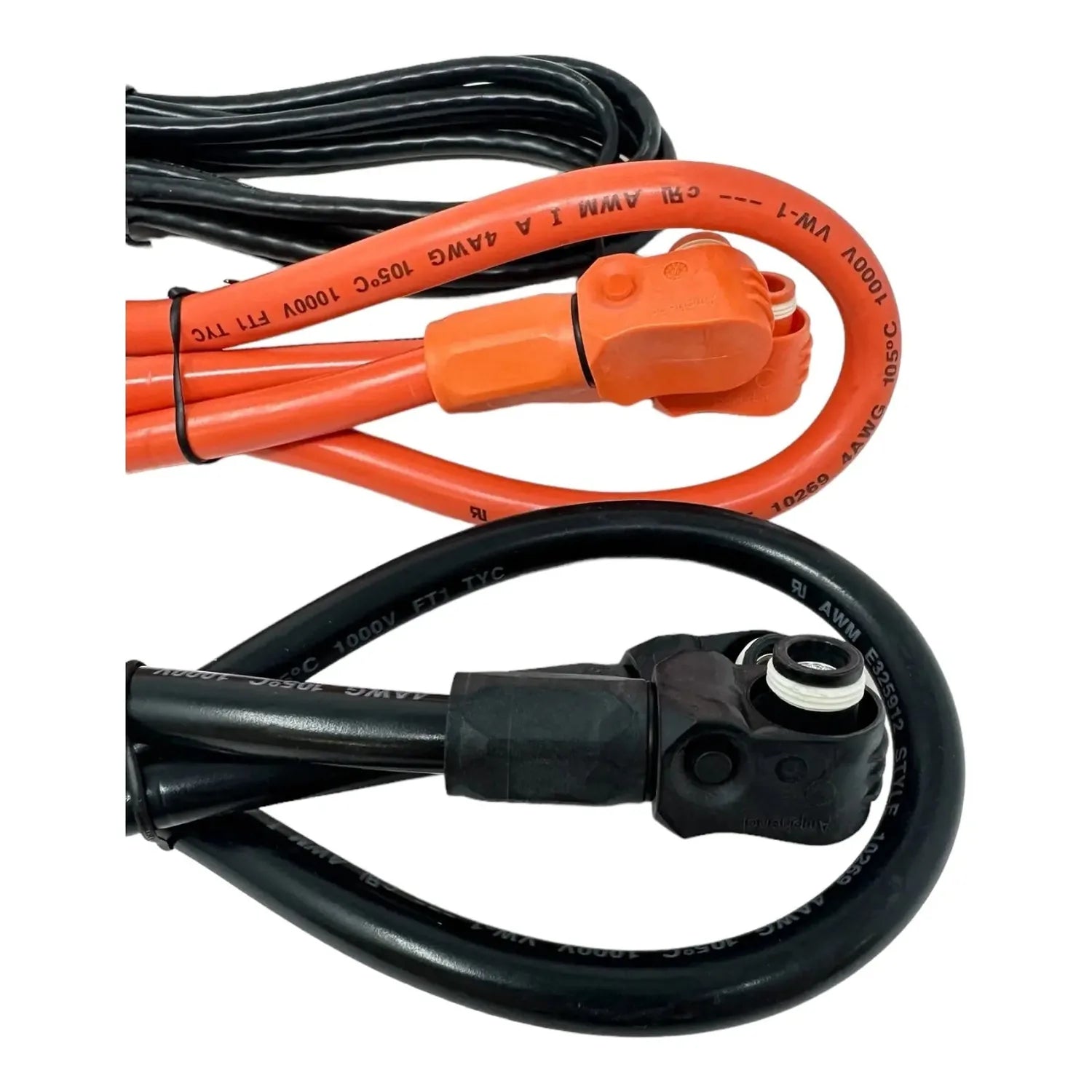Two battery extension cables coiled and displayed: red cable with orange connector and black cable with black connector, show