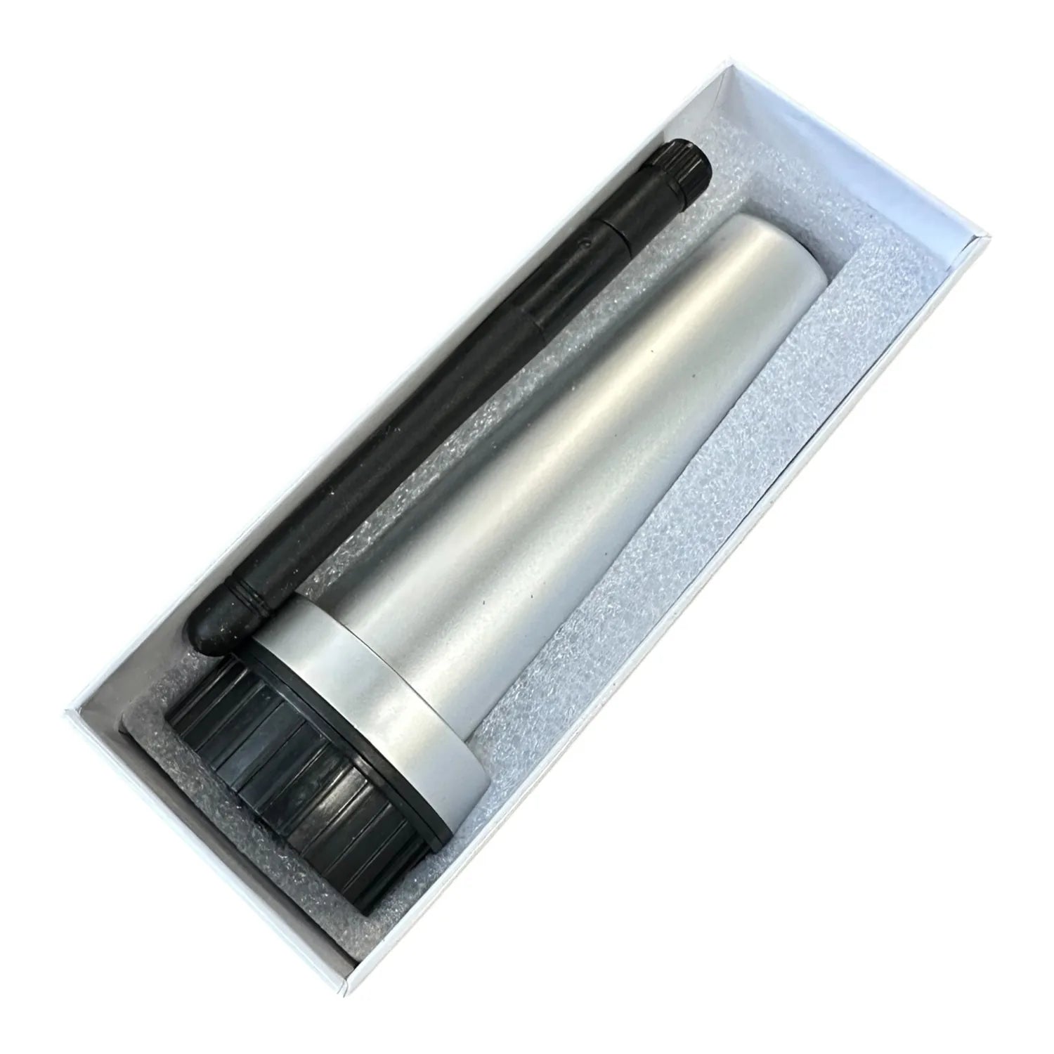 Solis S3-WiFi-ST data logger in protective packaging with black antenna and silver cylindrical body nestled in gray foam inse