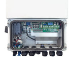Interior view of Solis 6kW hybrid solar inverter showing circuit boards, connectors, and terminal blocks mounted in weatherpr