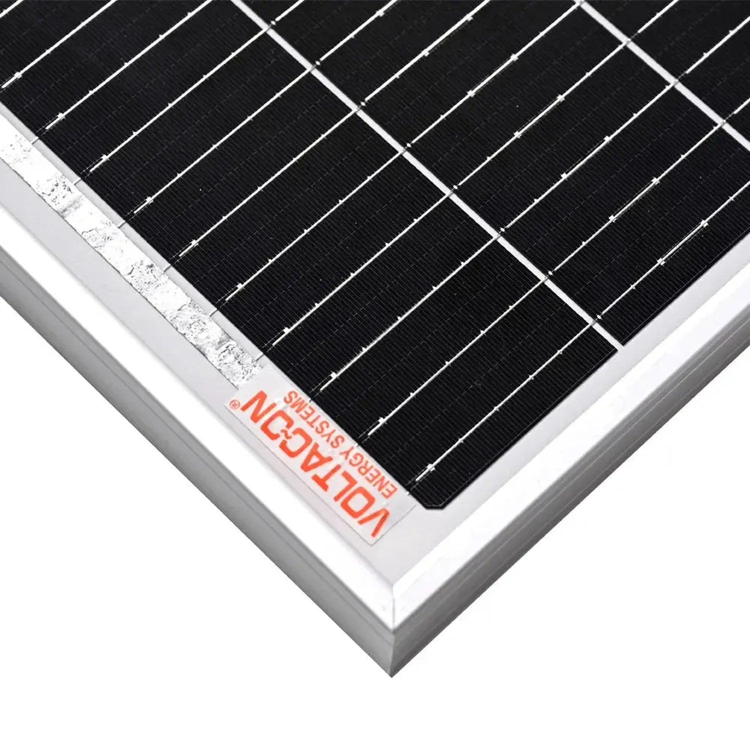 Close-up of 180W monocrystalline solar panel showing black cells in herringbone pattern, white aluminum frame, and orange man