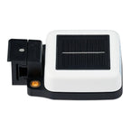 White and black solar-powered wireless monitor with adjustable mounting bracket and small solar panel on top surface.