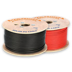 Two wooden cable drums with black and red solar PV cable spools, labeled Helukabel Energy Systems.
