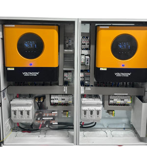 Two Voltacon energy systems inverter cabinets with yellow and black fascias, displaying installation shot with internal compo