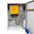 Voltacon Energy Systems off-grid inverter cabinet with yellow and black control unit, electrical components, and cooling fans