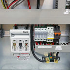 Off-grid inverter cabinet interior showing battery protection module, PV input protection, isolator switch, and circuit break
