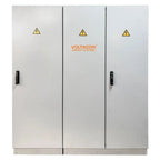Voltacon Energy Systems floor-mounted power cabinet with three white doors, black handles, and electrical hazard warning symb