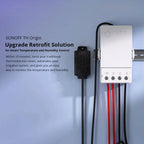 Sonoff TH Origin smart switch with white faceplate, control knobs, and connected power cables displayed against gradient blue
