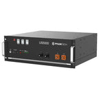 Pylontech US5000 lithium battery system in black rackmount enclosure with orange power terminals and status indicator lights.