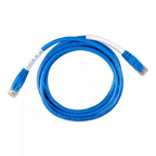 Blue Ethernet network cable with RJ45 connectors coiled on white background, product shot.
