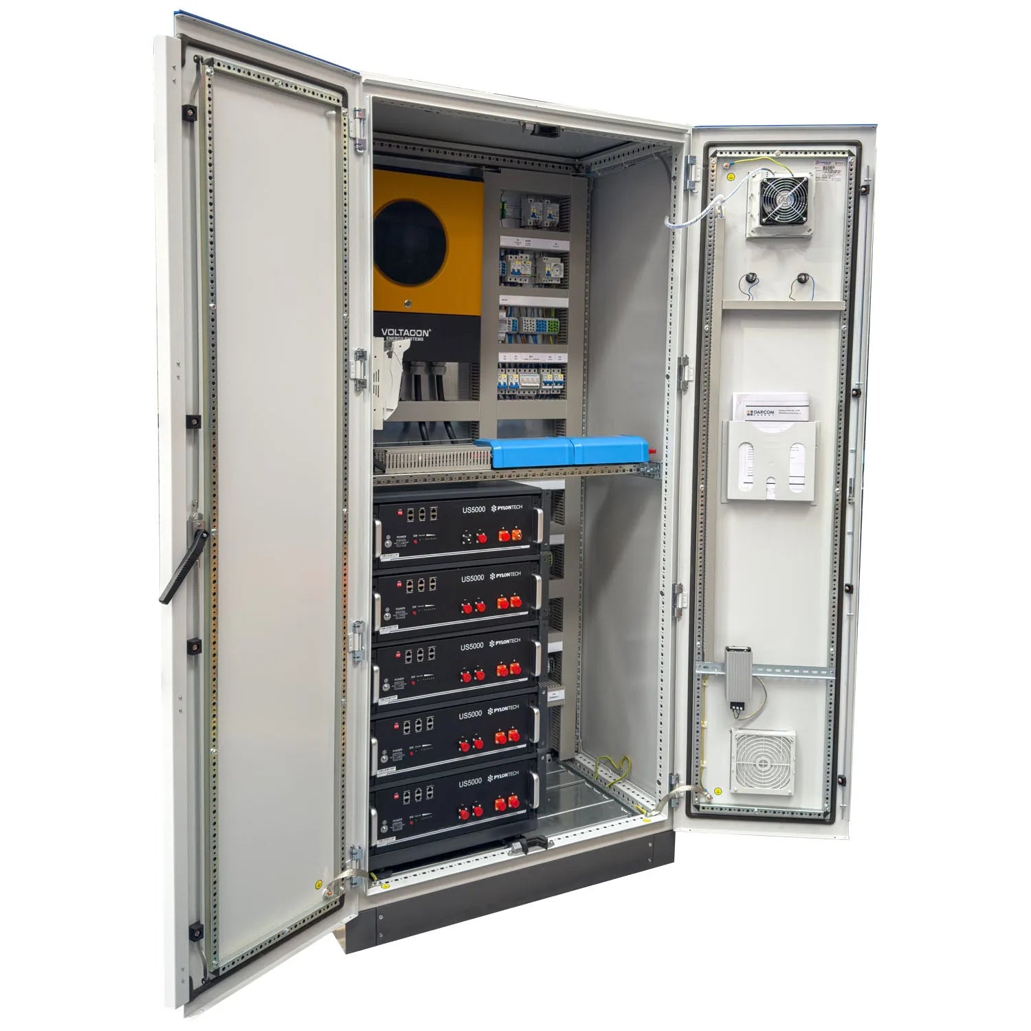 Open electrical enclosure showing Voltacon power cabinet with yellow transformer, control modules, five stacked UPS5000 units