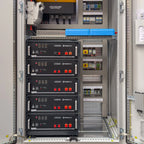 Industrial energy storage cabinet showing five stacked Pylontech US5000 units with red connectors, Voltagon inverter, and ele